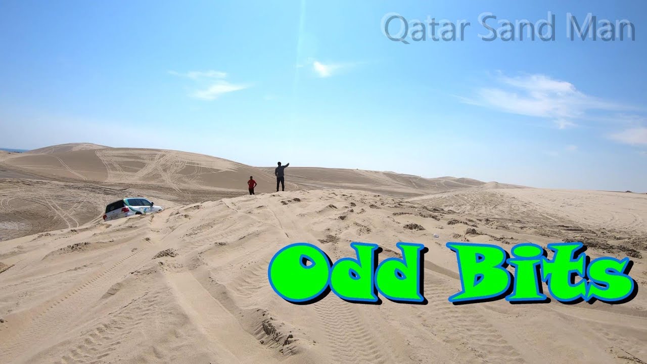 Vehicles  stuck in sand at Khor Al Udeid, inland sea area of the Qatar Desert.
