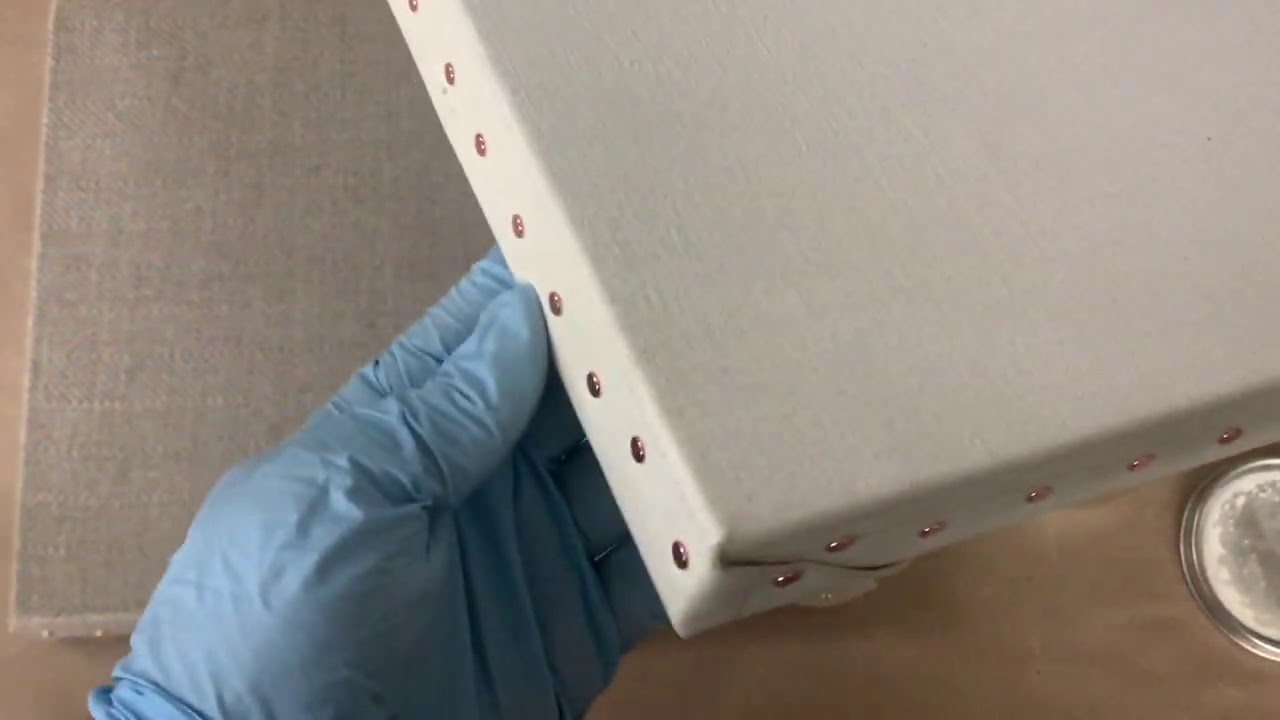 Applying the Oil Ground (lead white) to Linen