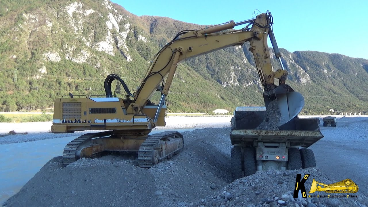 LIEBHERR 974 EXCAVATOR Digging and Loading Gravel on Dumper Perlini