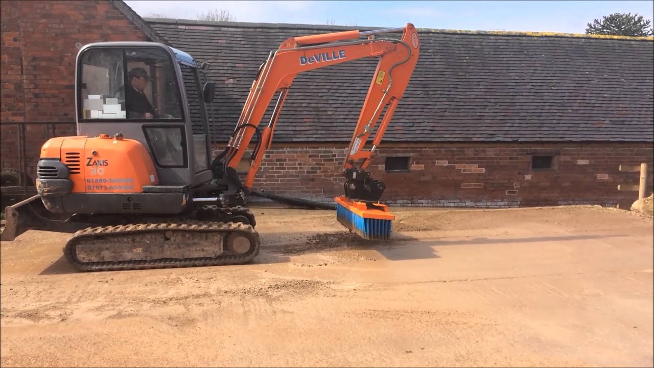 Phil Deville's EX30 Mini excavator with Abiljo yard sweeper brush