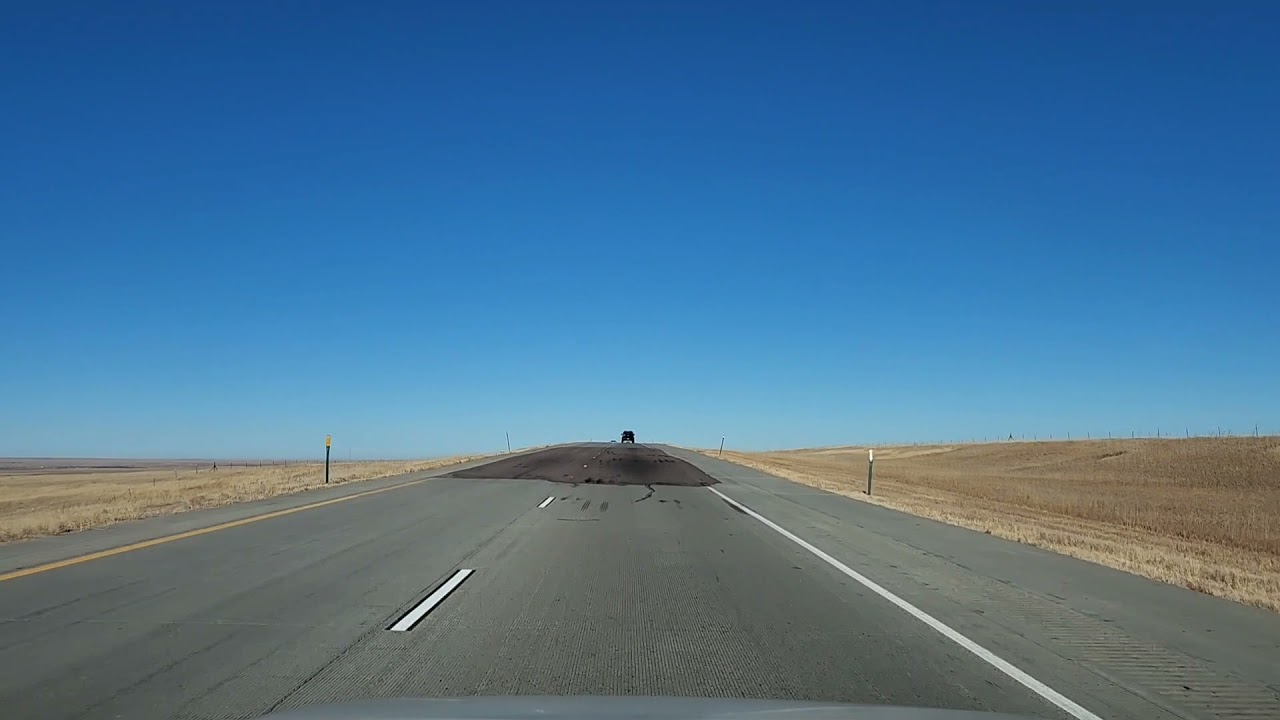 Driving towards the Rocky Mountains on I-70 in Colorado