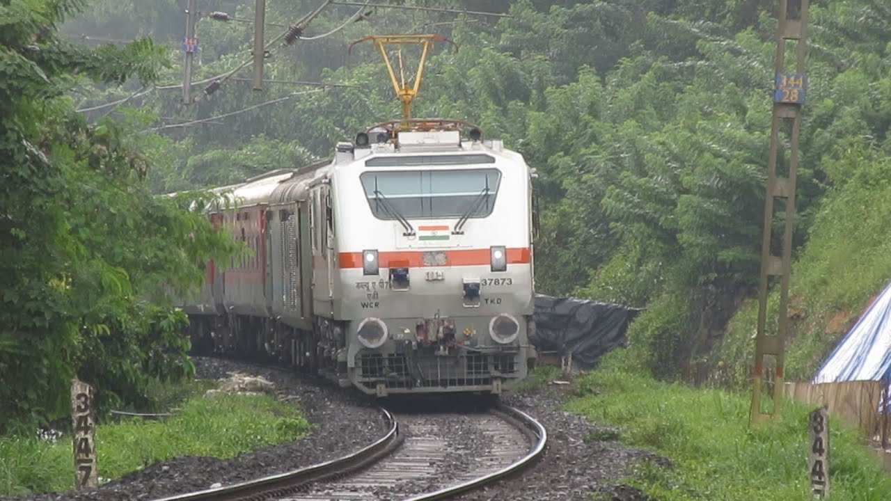India's First Aerodynamic WAP7 with Goa Rajdhani! 3 in 1 Monsoon Konkan Railway Train Compilation!!