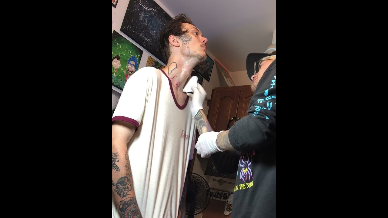 SEED OF LIFE THROAT TATTOO