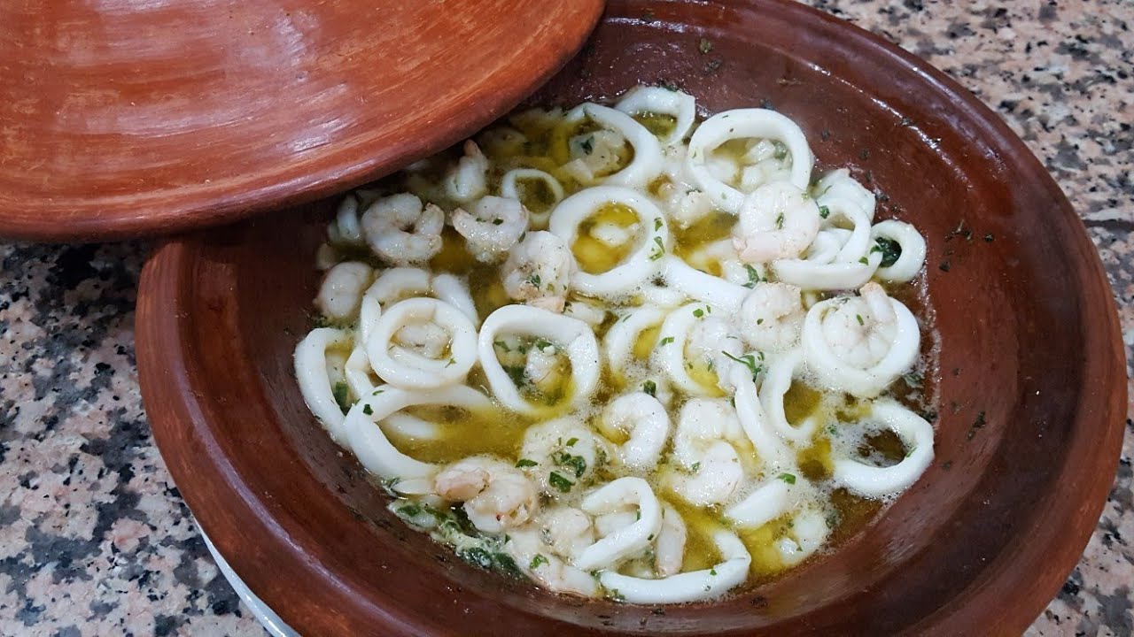 طاجين الكروفيت و الكلمار بزيت الزيتون و الثوم وصفة من المطبخ الإسباني