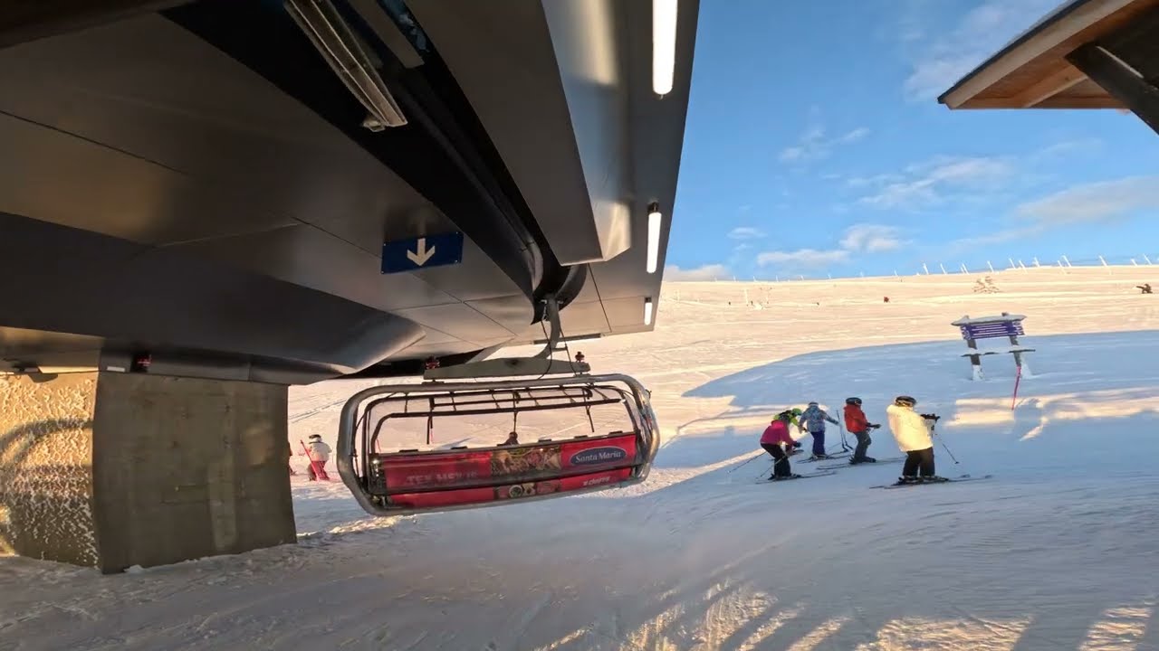 skiing Ylläs sunrise with chairlift Jan 2023