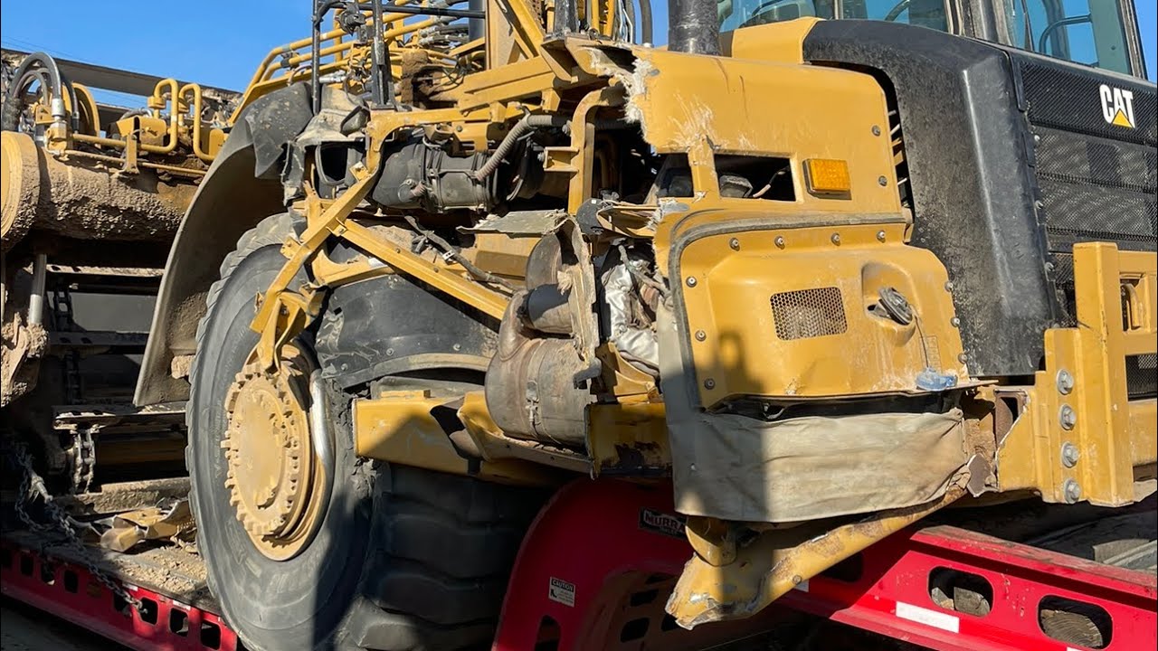 CAT 623 Hits Freeway Pillar