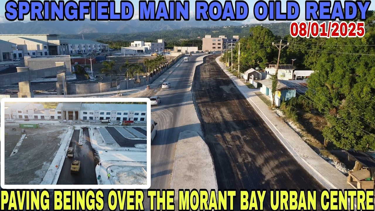 SPRINGFIELD ROAD OILED||SECTION OF THE MORANT BAY URBAN CENTRE BEING PAVED||SCHIP