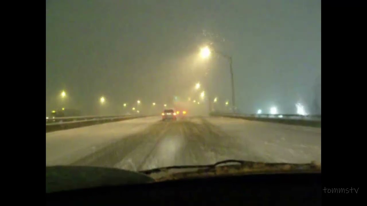 Snow Storm, took I-75 south to Ohio I-80 east to..., hand held filming, while one hand steering.