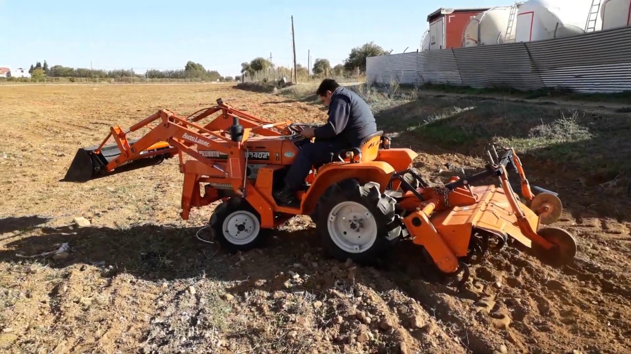 Mini tractor Kubota B1402-DT con pala de carga frontal - Rotovator.