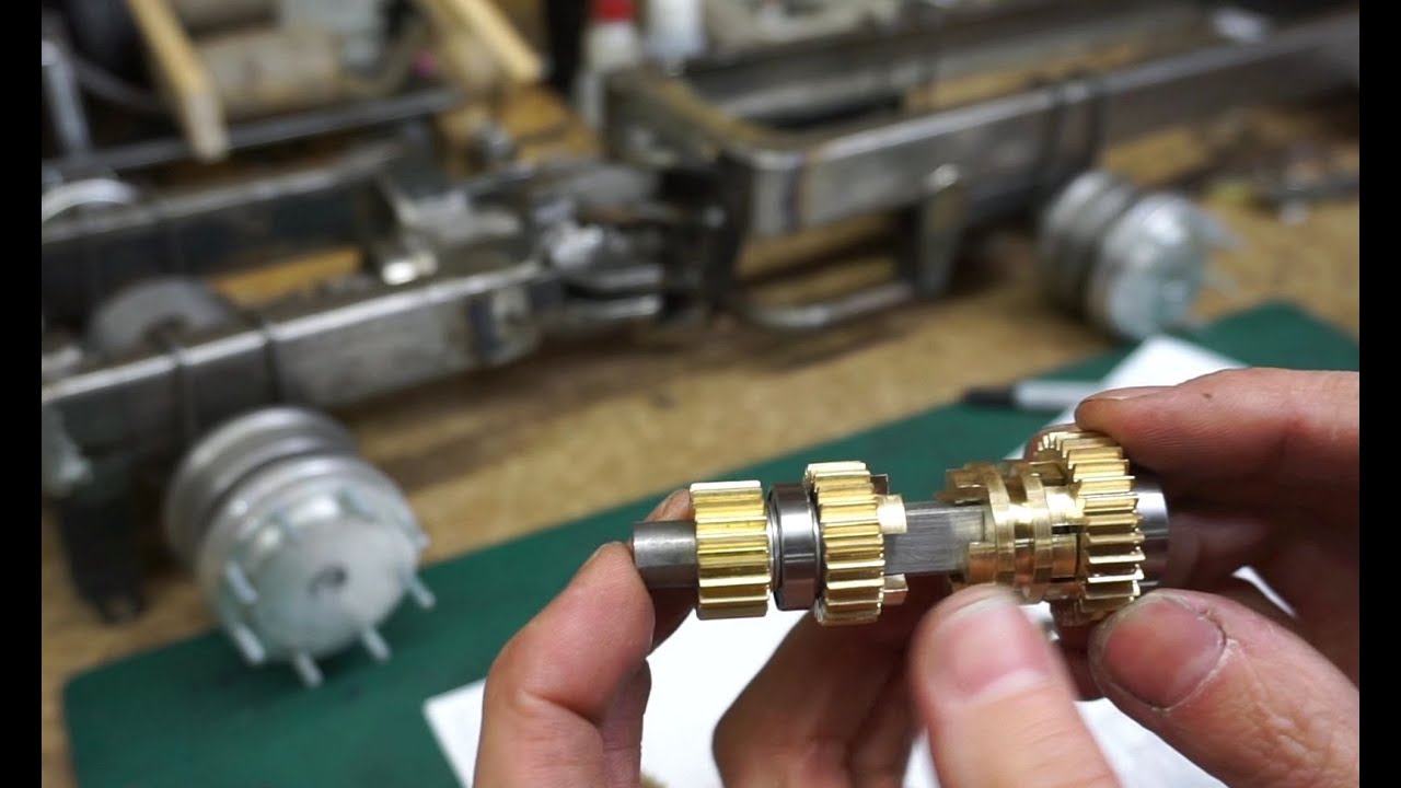 Кулачковая муфта и шестерни передач в зацепление