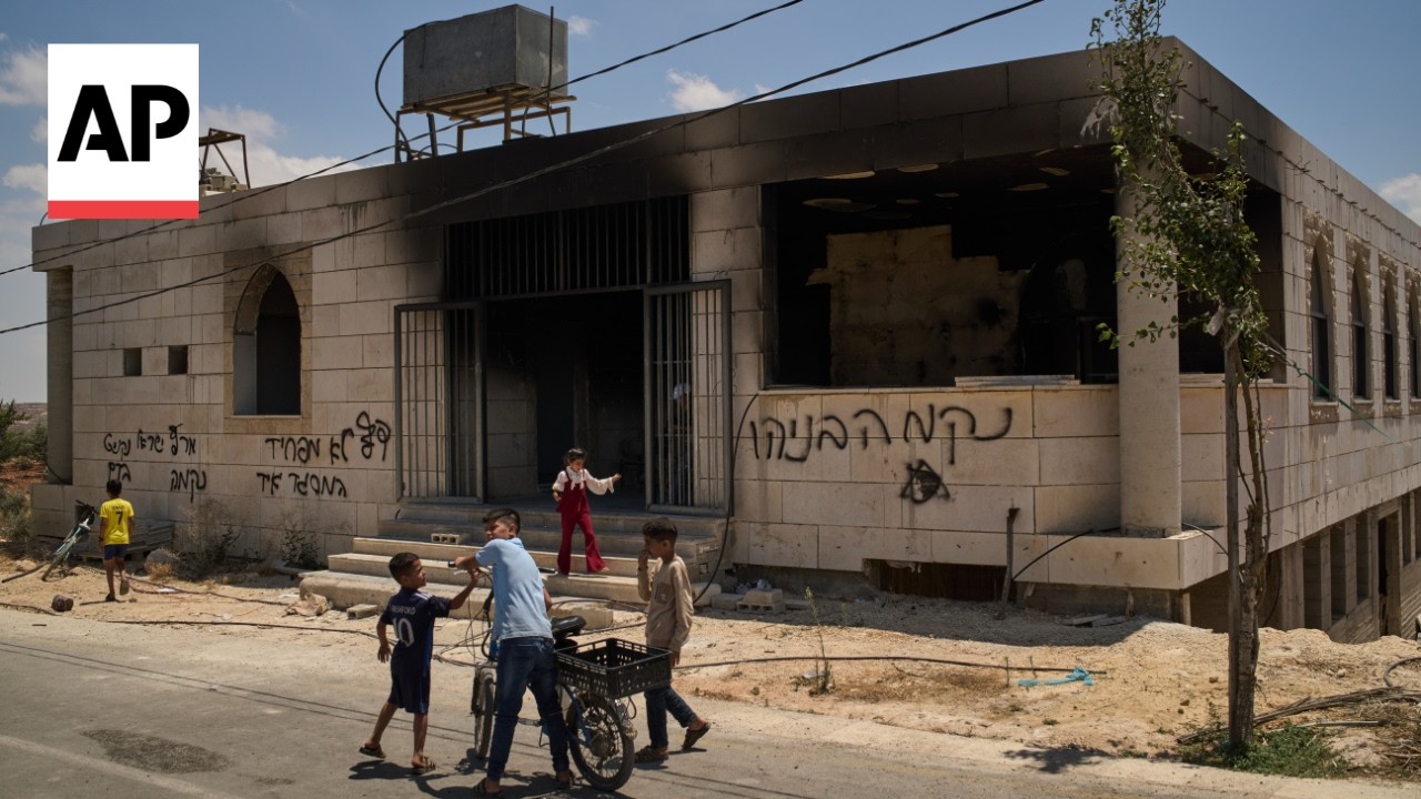 Palestinian says settlers 'torched' a mosque in the West Bank