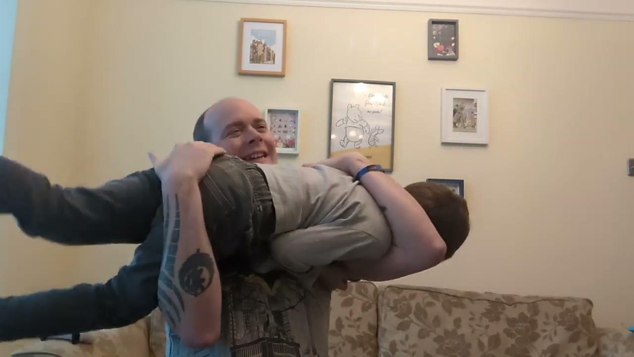 Play fighting with my dad.