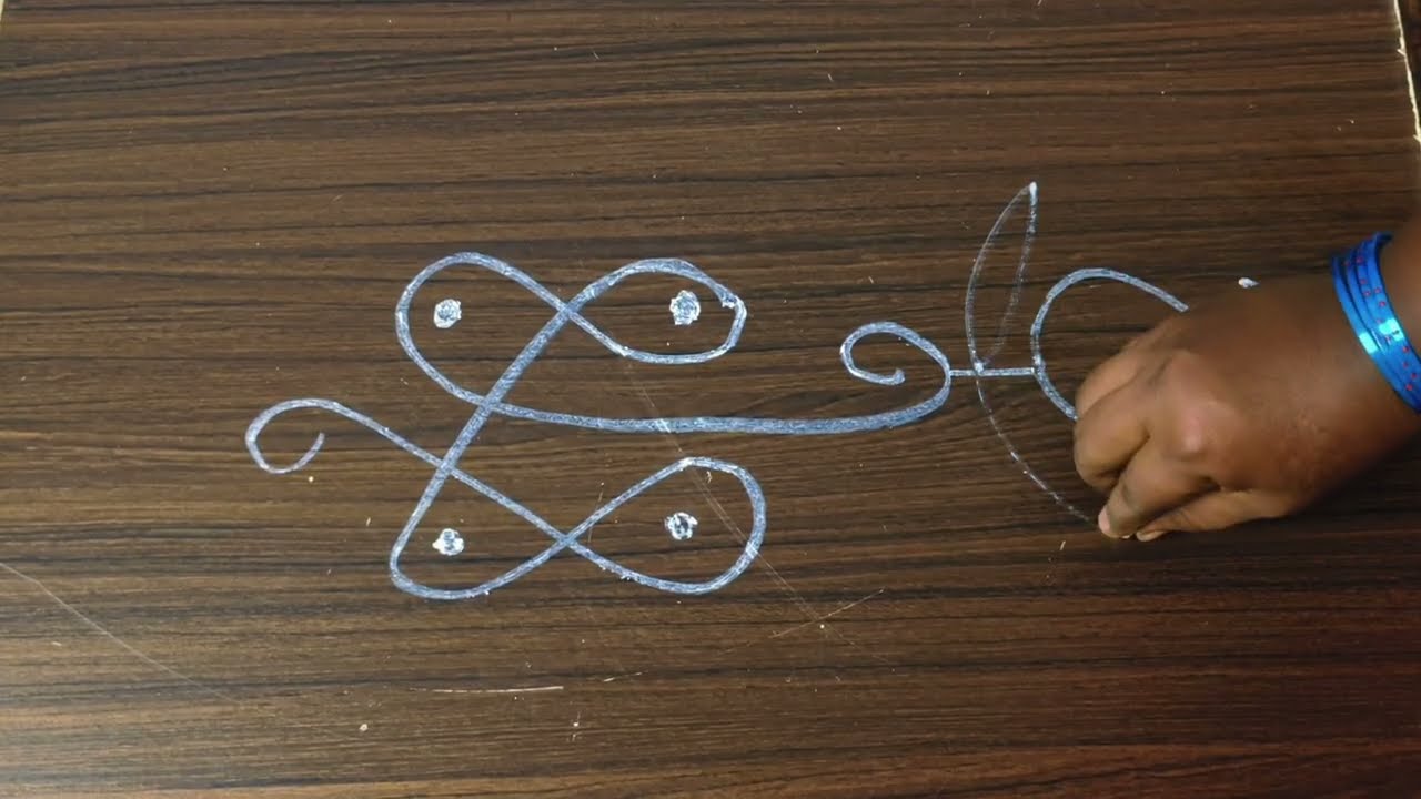 Easy Muggu in 1 Minute | Beautiful Rangoli #Shorts