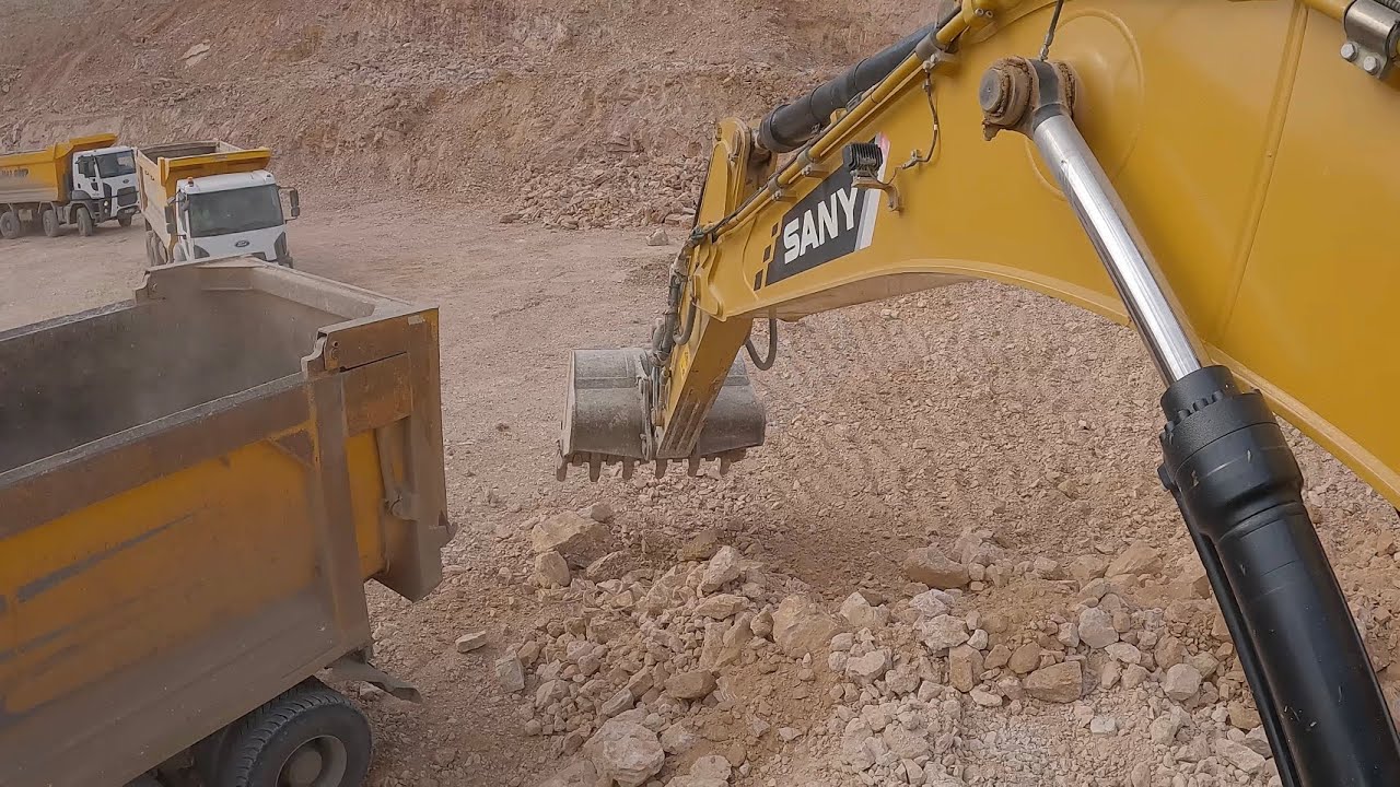SANY Excavator TO TRUCKS LOADING STONES