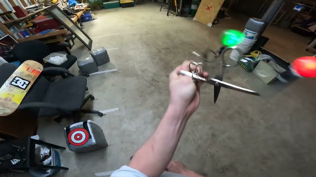 Weird looking alien with scissors