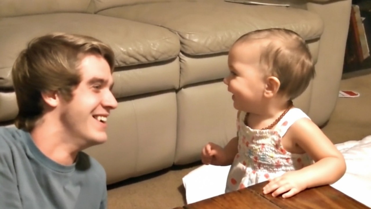 Big Brother Plays Peek-A-Boo With Little Sister