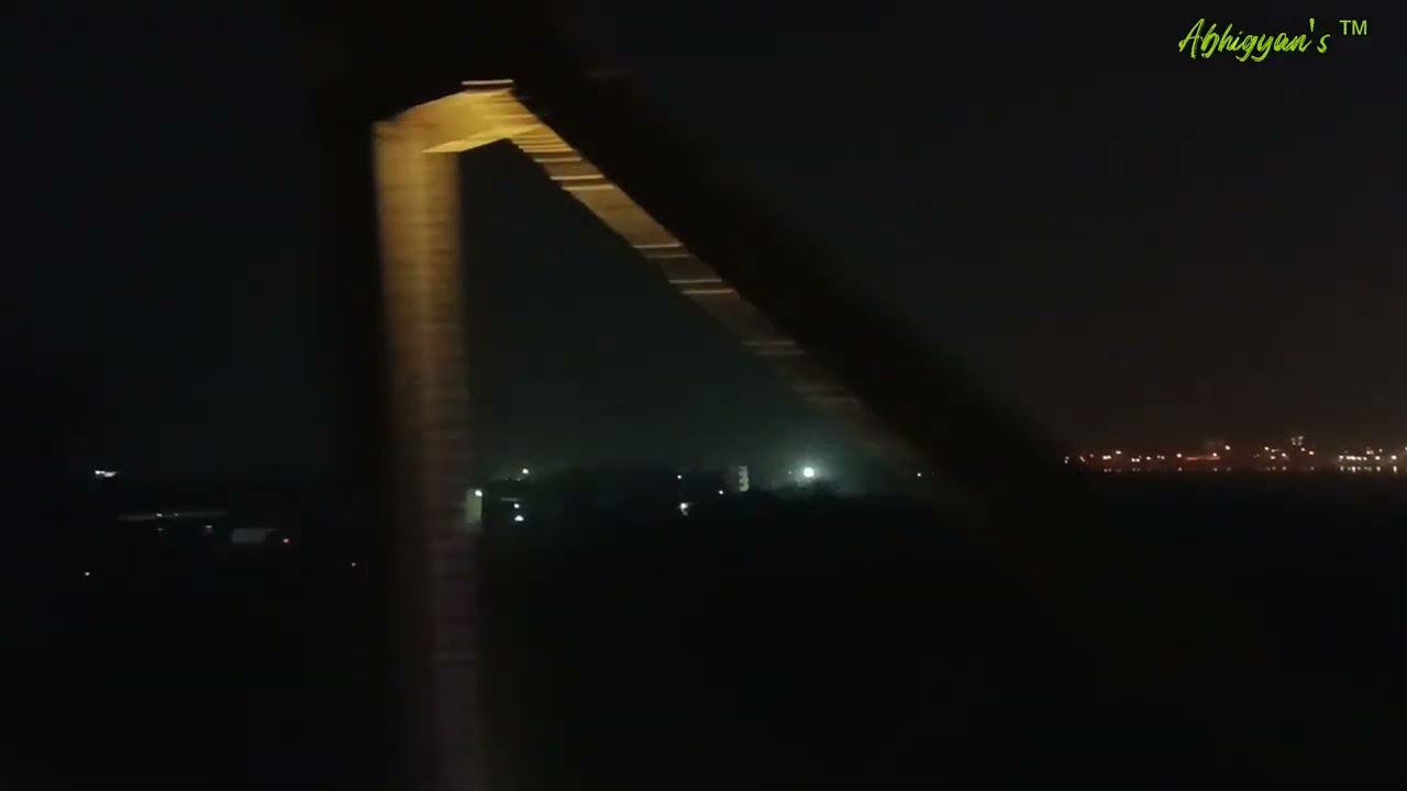 Sealdah bound Amrit Bharat Express crosses the century old Malviya Bridge over River Ganga at Kashi