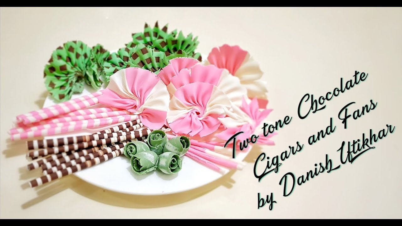 Two Tone Chocolate Cigars and Fans by Danish Iftikhar
