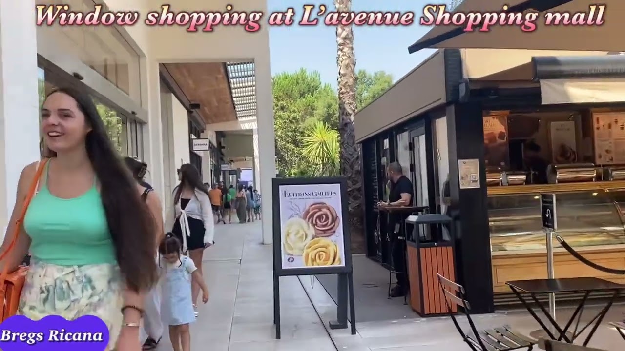 Window shopping in L’avenue shopping Mall Toulon France 1