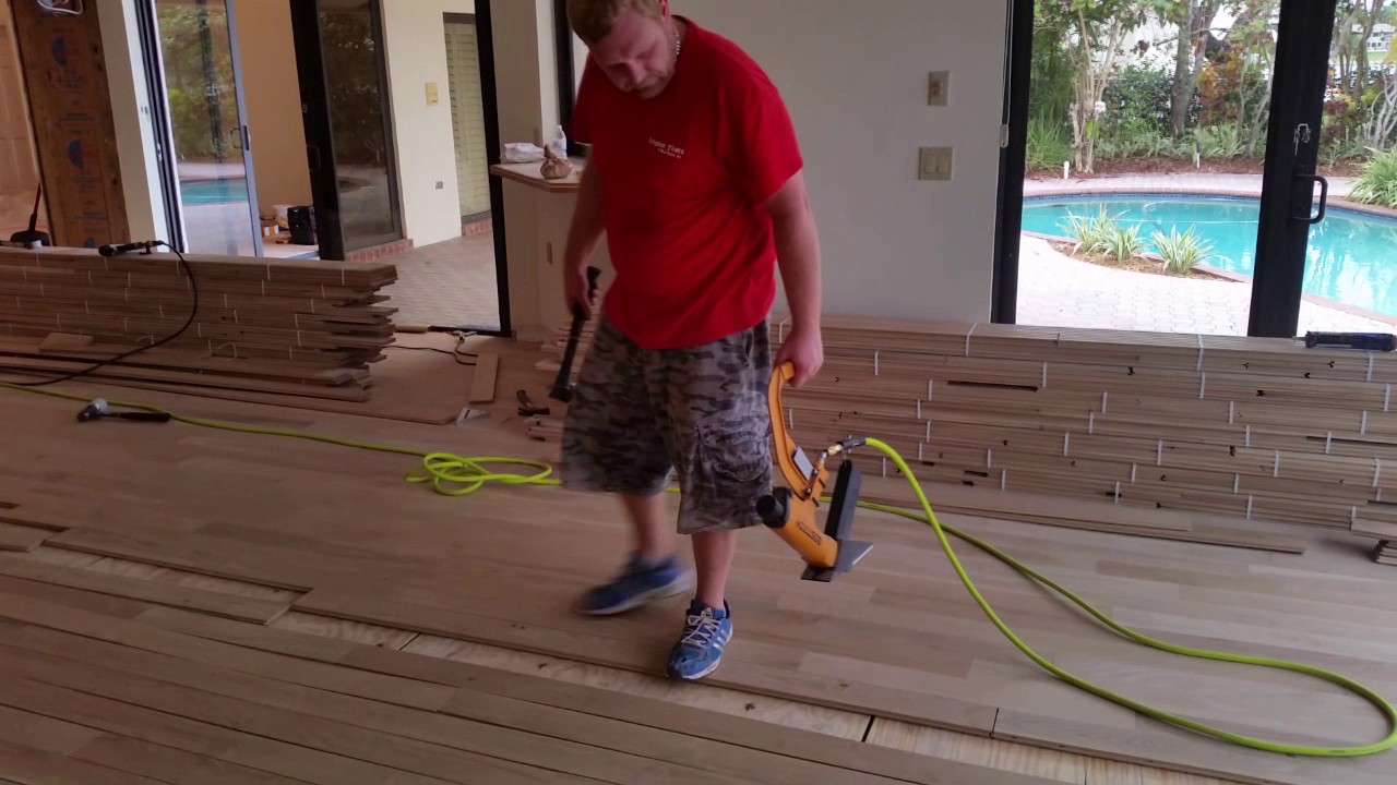 Solid hardwood floor installation with sanding Kingdom Floors of Boca Raton South FL