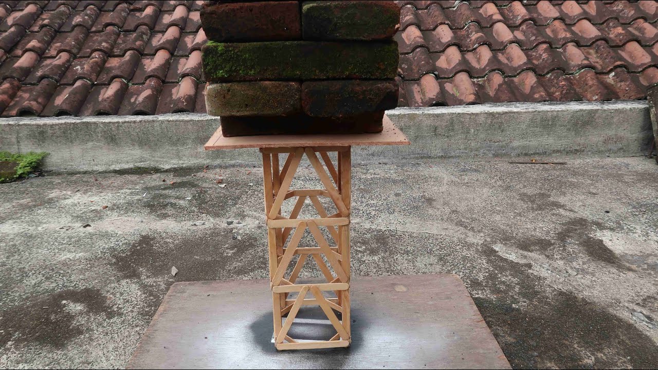 Making a strong tower using popsicle sticks & testing it