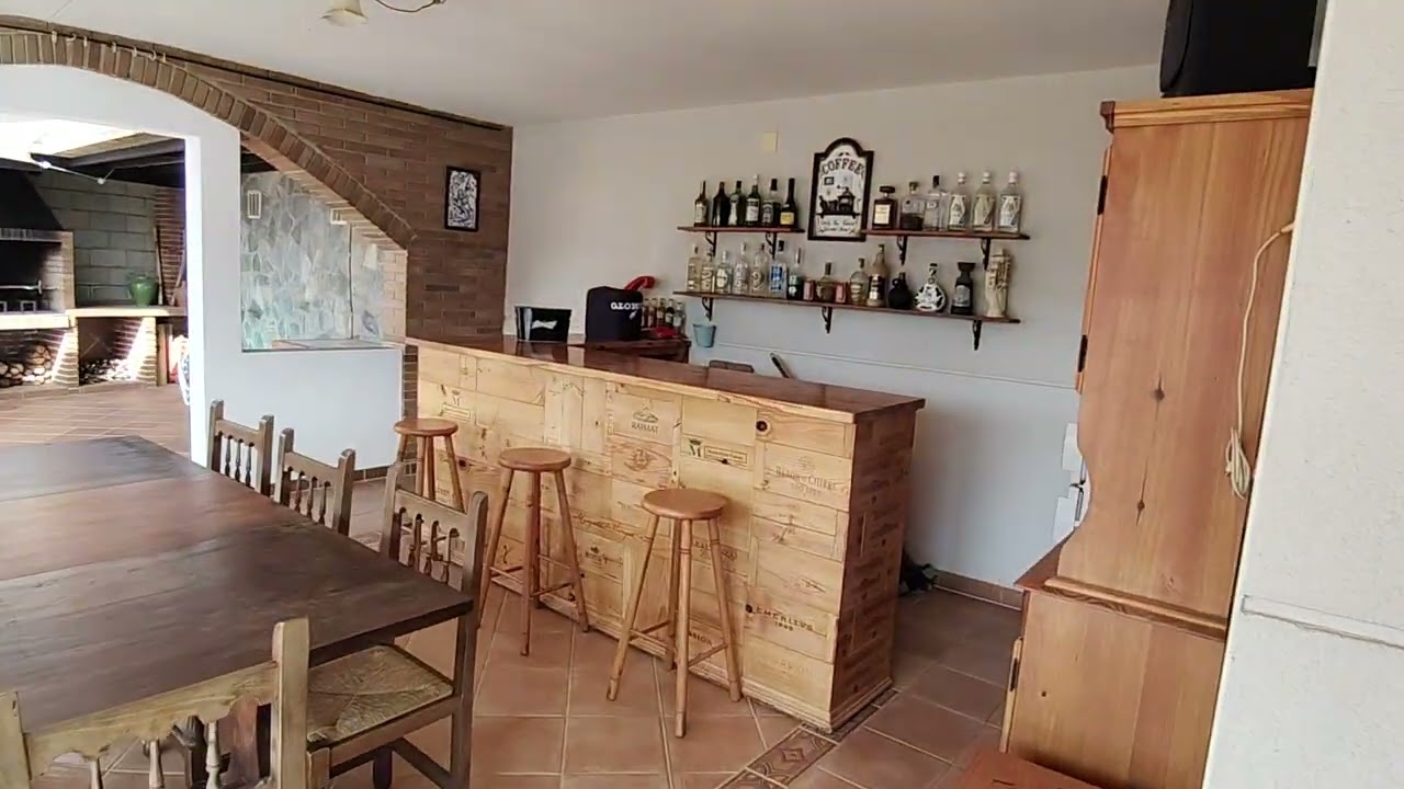 Casa Sant Fost. Planta baja, jardín y piscina