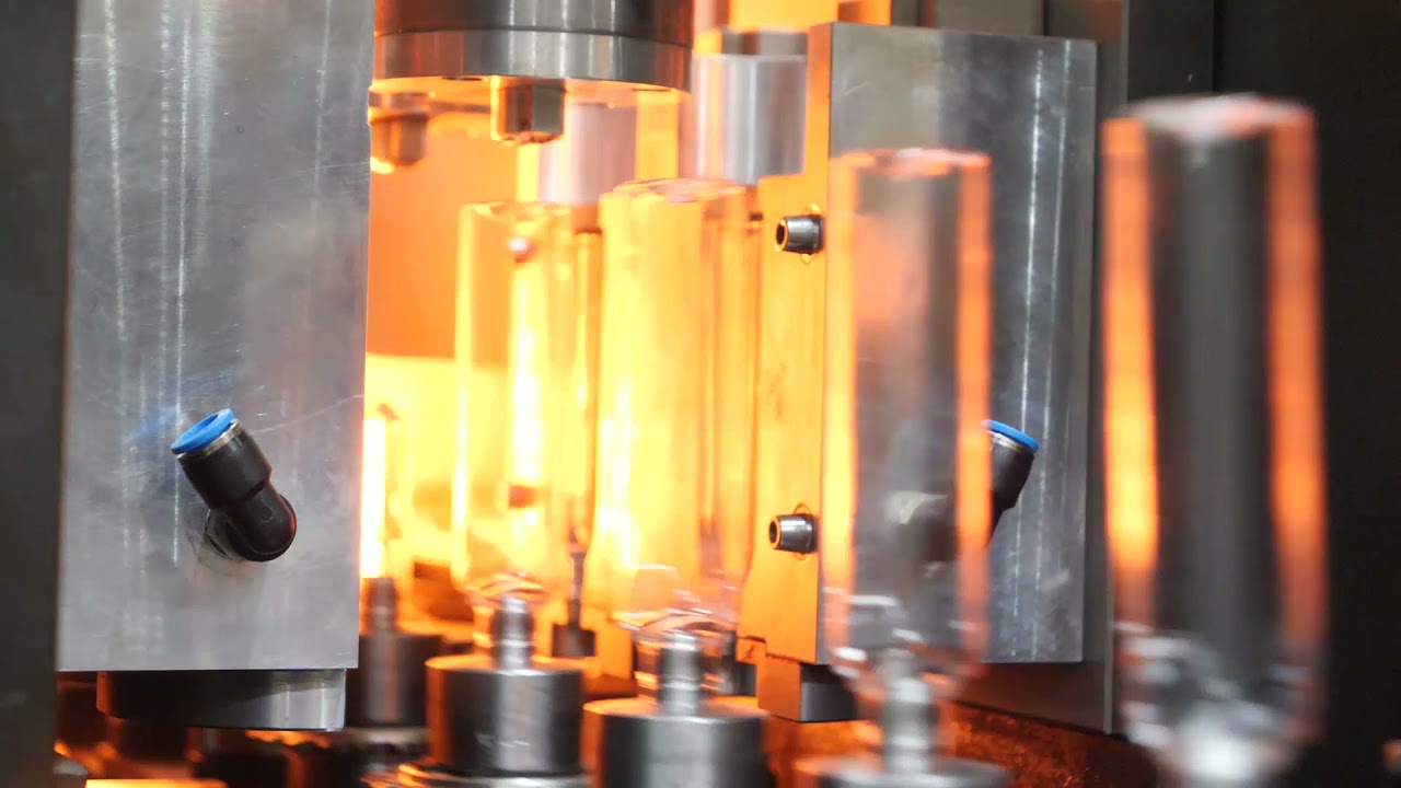 Demark DBH Series Hand-Feed PET Blow Molding Machine | Flexible Small-Scale Bottle Production