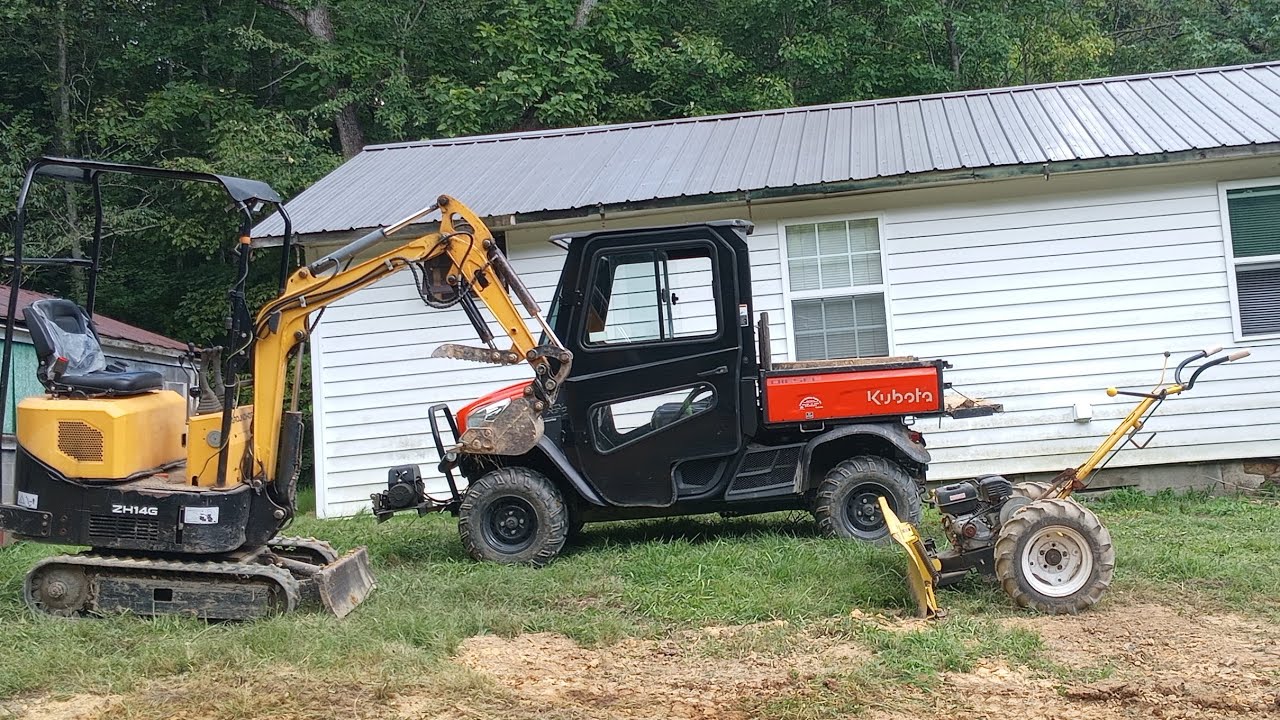 Groundhog=Kubota=1951 Montgomery Ward walk behind (job is finished )