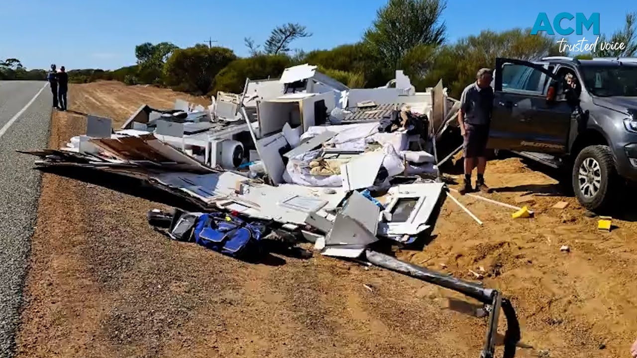 Caravan smashed to pieces after collision with truck