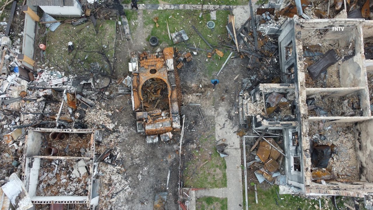 Houses Burned Down and Russian Tank in Woman's Back Yard 