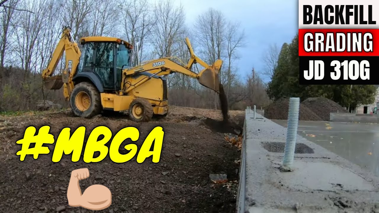 Backfilling and Grading Monolithic Slab with Jon Deere 310G Backhoe on a Homestead