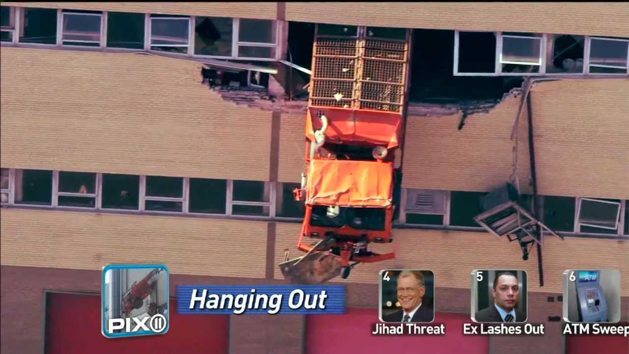 [VIDEO] Salt Truck Dangles From Queens Parking Garage - PETER THORNE - 8.17.11