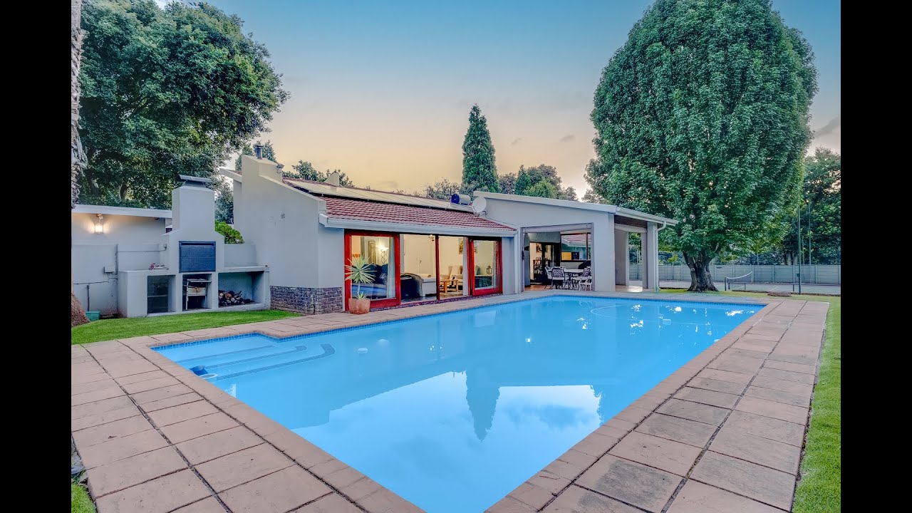 Contemporary, spacious and secure family home with tennis court & pool.