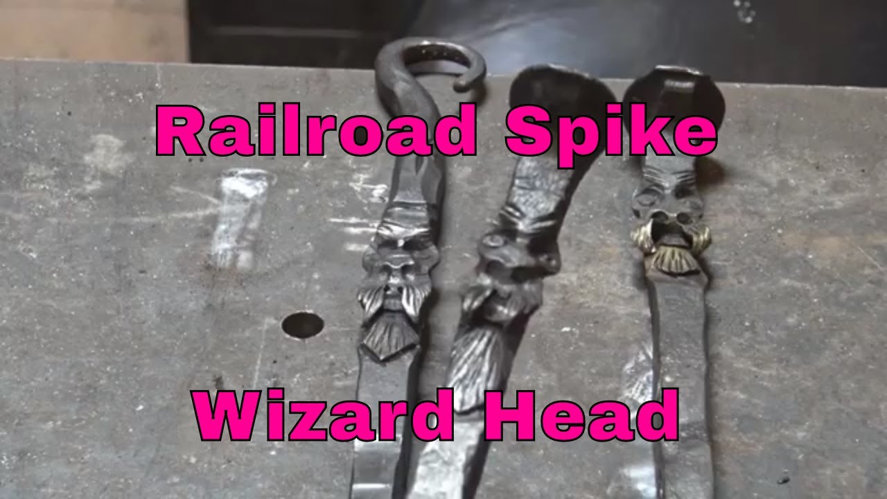 Forging a wizard head on a railroad spike - blacksmith
