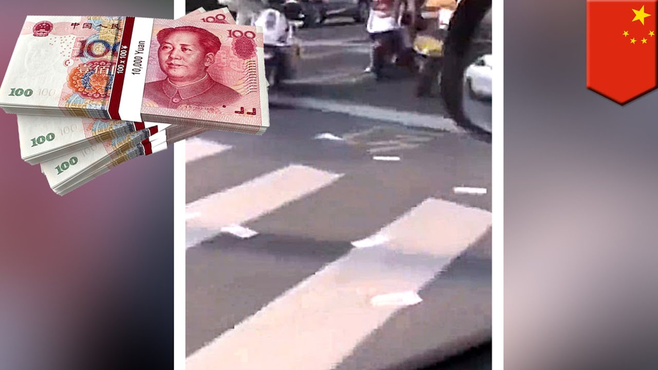 Chinese money found scattered all over the road - TomoNews