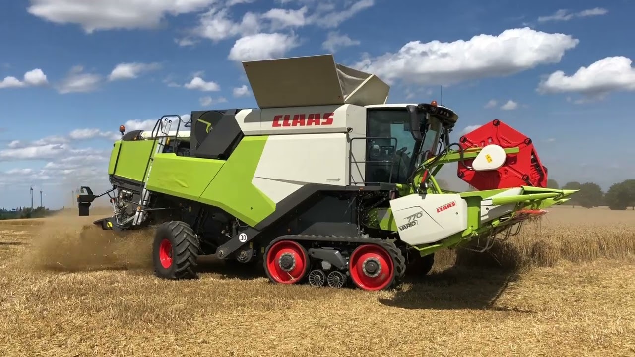 Claas Trion 750, Trion 730, Trion 660 and Trion 550 combines harvesting wheat in Germany