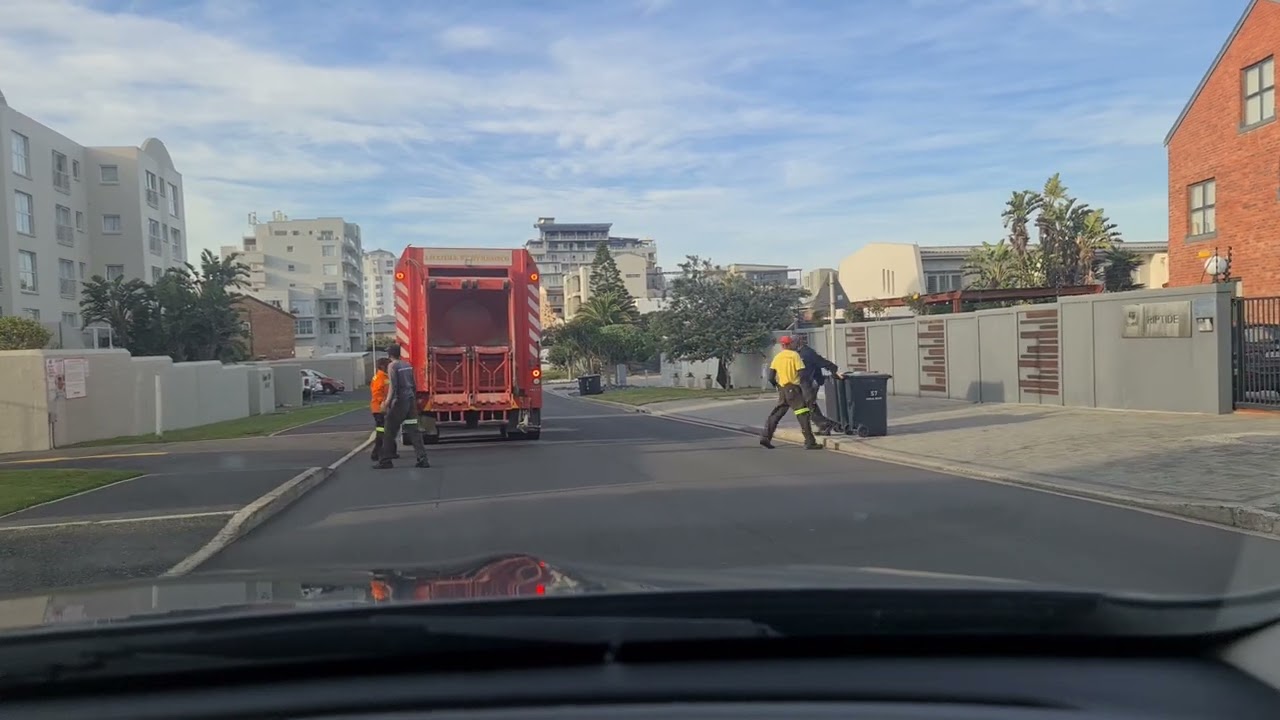 rotating garbage truck