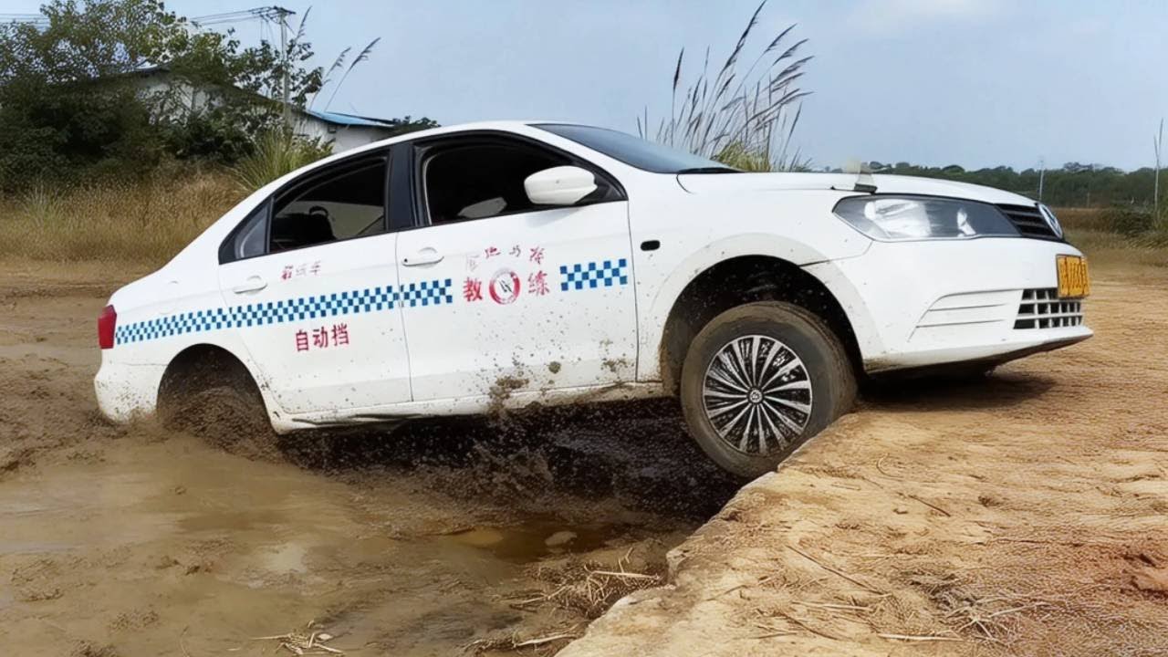 The Rear Half Of The Car Fell Into The Mud, And The Driver Put On His Best Effort
