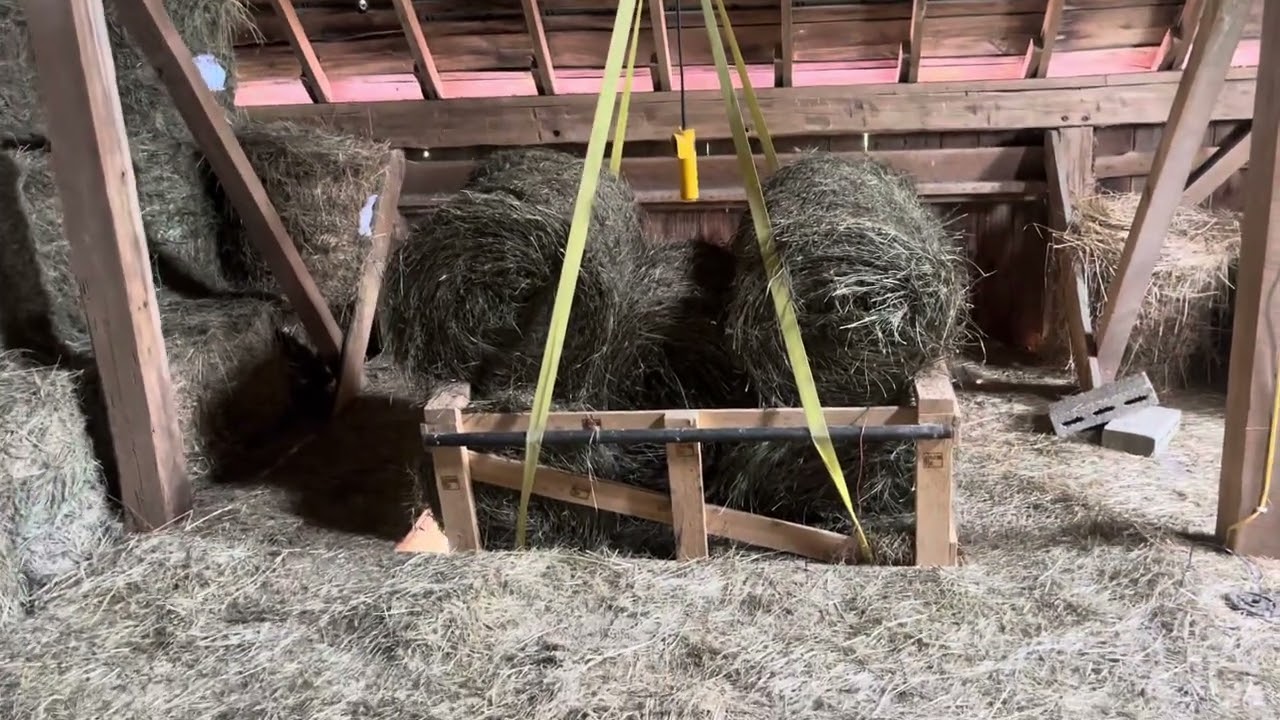 Stacking Mini Round Bales in a Hay Mow