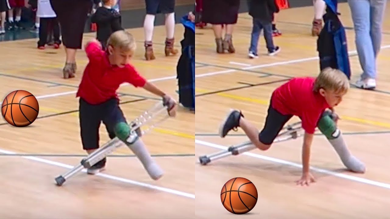 KID ON CRUTCHES FALLS DOWN PLAYING BASKETBALL!