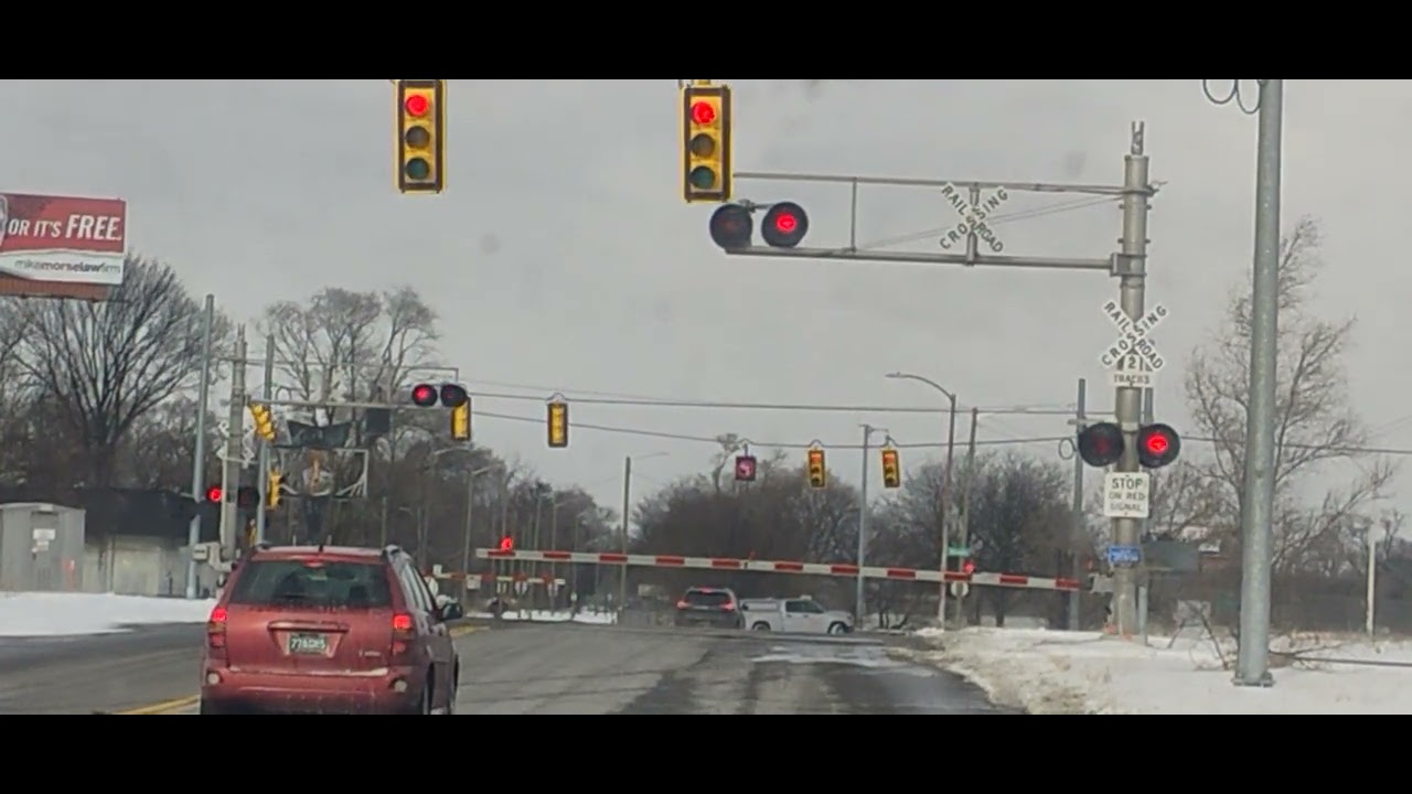 Thursday afternoon at Oakland Ave and Nevada Ave Eastside of Detroit Amtrak train going through 
