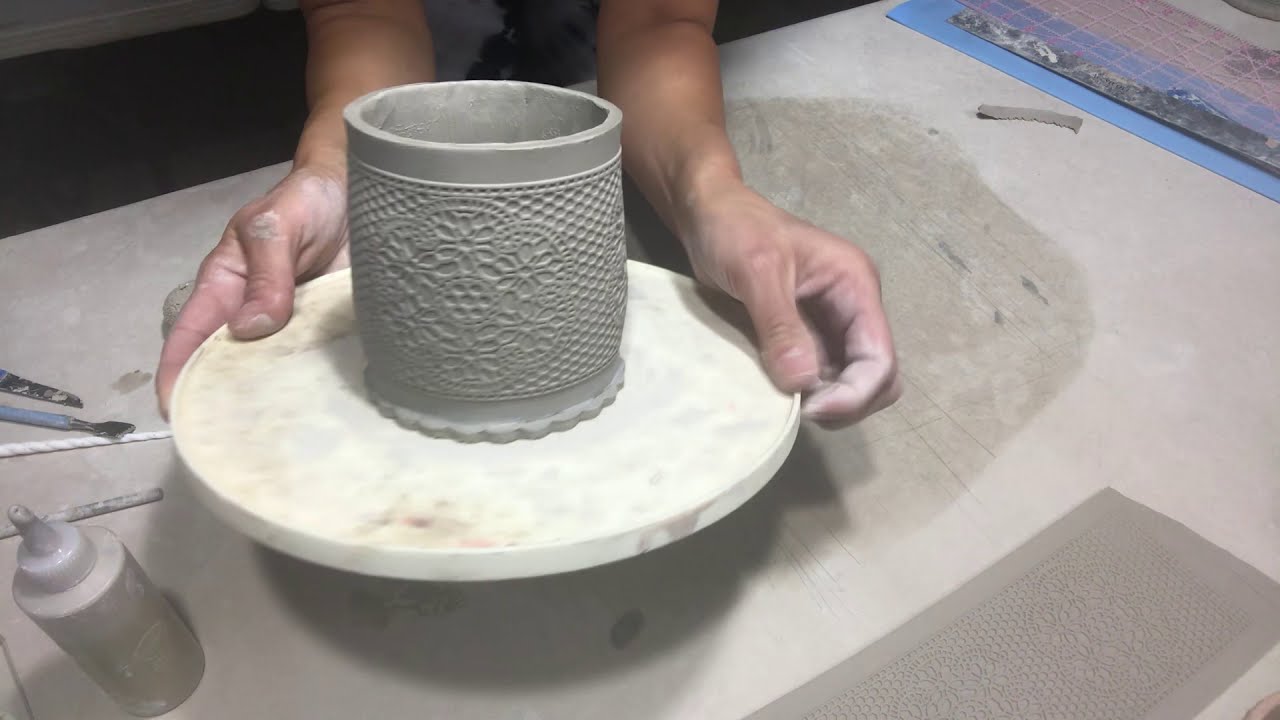 Slab built bellied mug with a lip