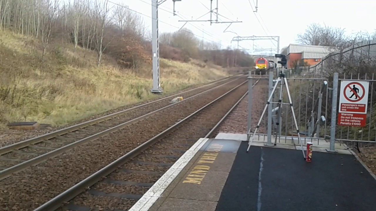 Class 67015 dragging 385102 passes Carmyle 10/12/2016