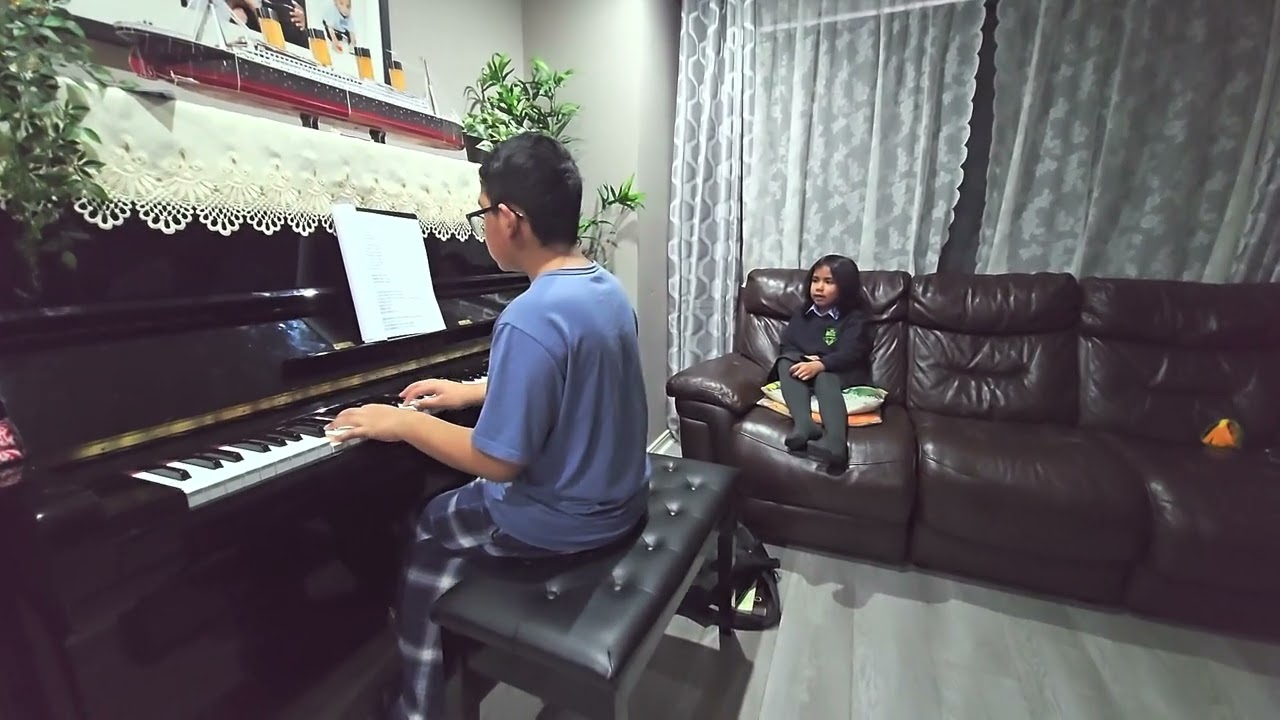 ''May be'' by Zoey 6 years old . Pianist : Reilly  9 years old.