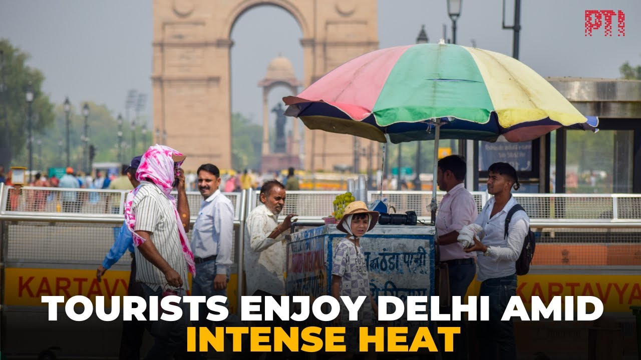 Tourists enjoy Delhi amid intense heat; IMD forecasts slight temperature drop