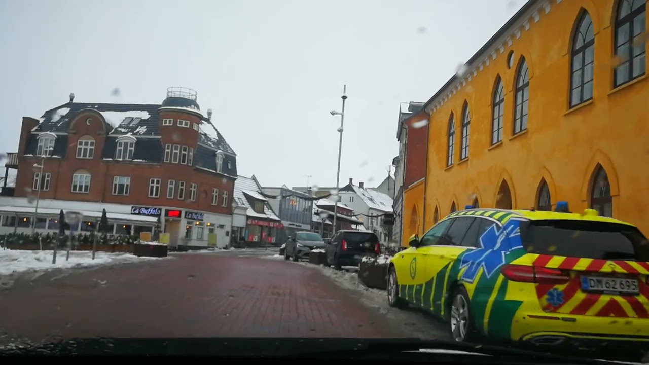 Driving in Vordingborg in Denmark. First Snow. Autumn