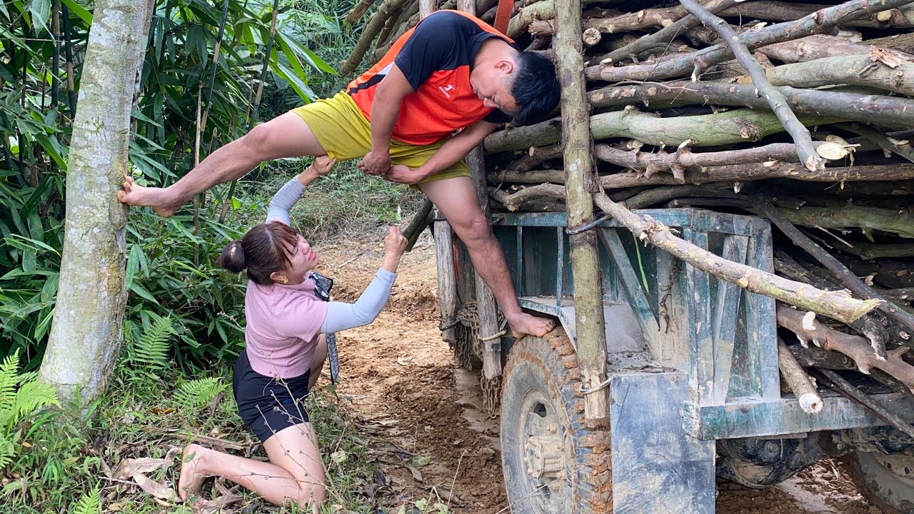 The girl used a chain to navigate the slippery, steep roads.