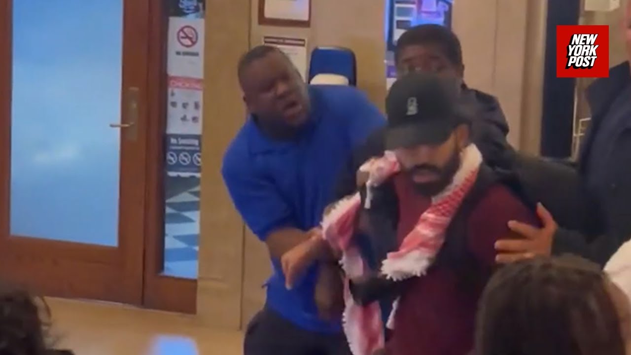 Columbia University protester resists detainment by Public Safety officers