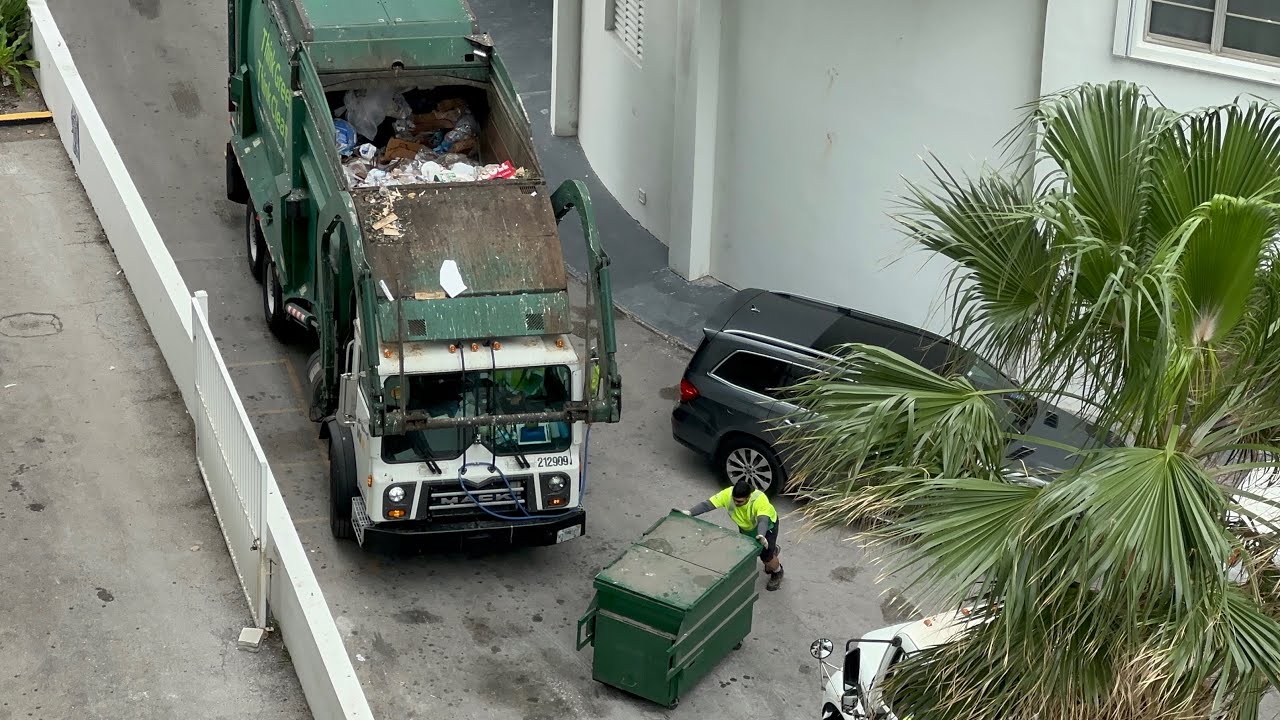 WM Front Loaders Packing out on Florida alley trash (from balcony)