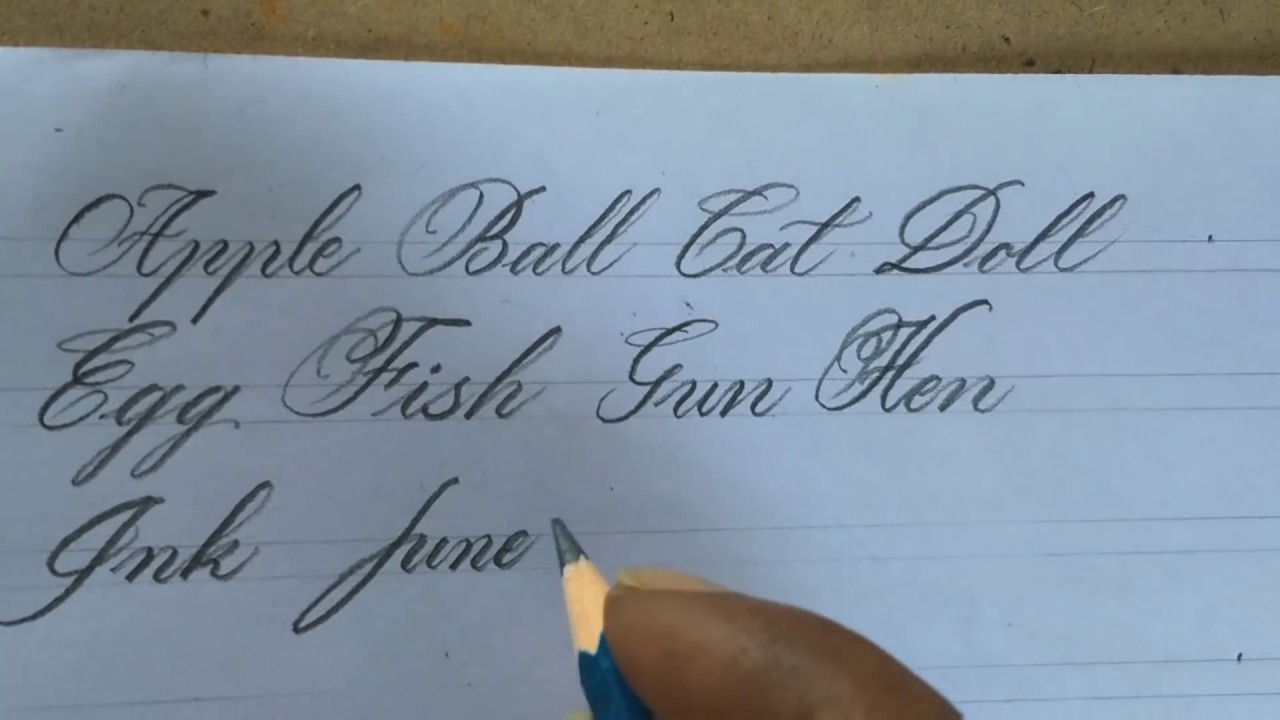 Pencil handwriting Capital and small letters l pencil Calligraphy